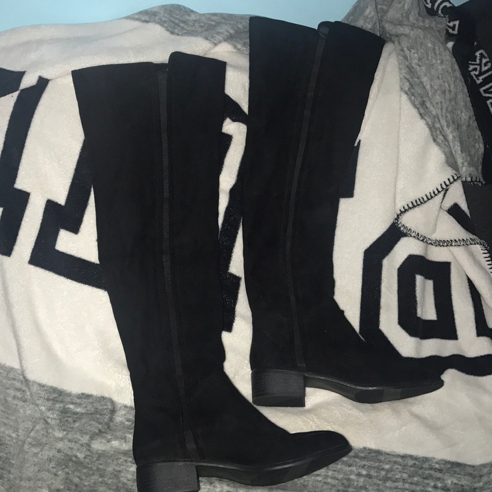 Thigh high black boots